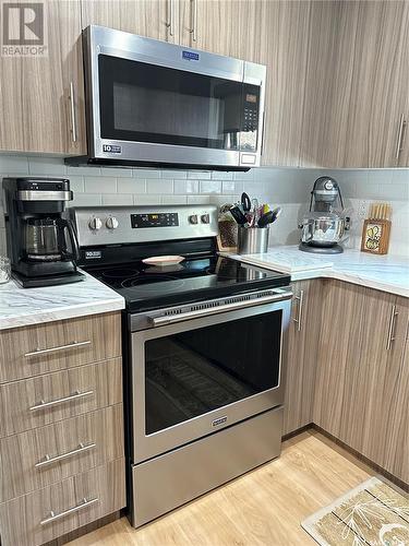 669 Dieppe Drive, Weyburn, SK - Indoor Photo Showing Kitchen