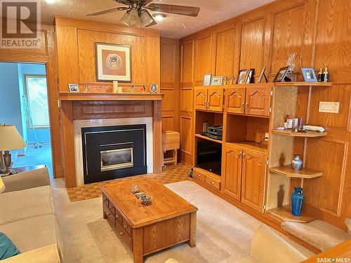 669 Dieppe Drive, Weyburn, SK - Indoor Photo Showing Living Room With Fireplace