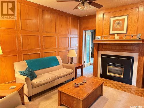 669 Dieppe Drive, Weyburn, SK - Indoor Photo Showing Living Room With Fireplace