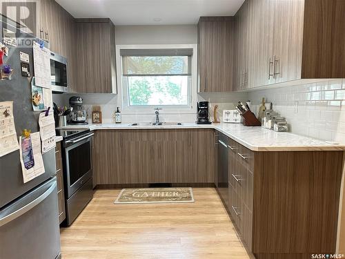 669 Dieppe Drive, Weyburn, SK - Indoor Photo Showing Kitchen With Double Sink