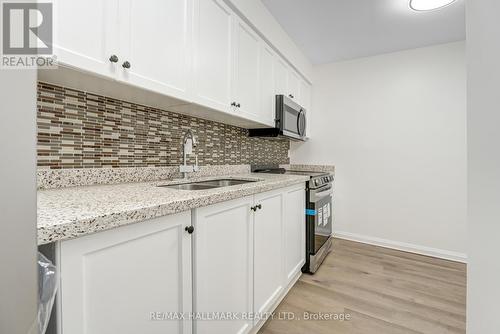 2025 - 100 Mornelle Court, Toronto, ON - Indoor Photo Showing Kitchen With Double Sink