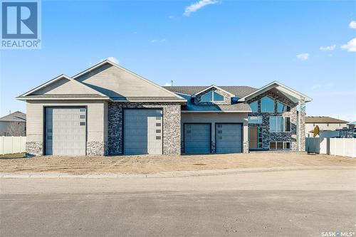 8 Loewen Court, Warman, SK - Outdoor With Facade