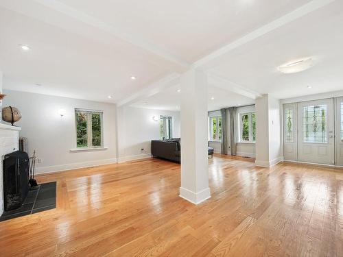 Living room - 24 Rue Wales, Saint-André-D'Argenteuil, QC - Indoor With Fireplace