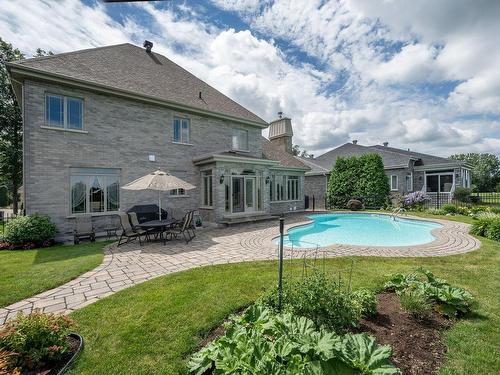 Back facade - 574 Rue Des Fortifications, Saint-Jean-Sur-Richelieu, QC - Outdoor With In Ground Pool