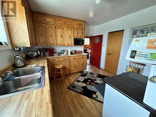 24-26 Caribou Road, Port Aux Basques, NL - Indoor Photo Showing Kitchen With Double Sink