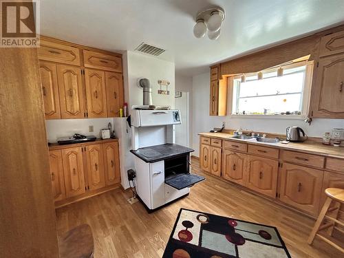 24-26 Caribou Road, Port Aux Basques, NL - Indoor Photo Showing Kitchen With Double Sink