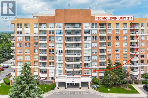 211 - 480 Mclevin Avenue, Toronto E11, ON - Outdoor With Balcony With Facade