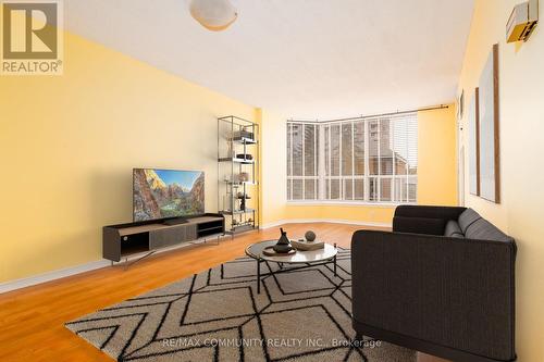 211 - 480 Mclevin Avenue, Toronto E11, ON - Indoor Photo Showing Living Room