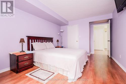 211 - 480 Mclevin Avenue, Toronto E11, ON - Indoor Photo Showing Bedroom