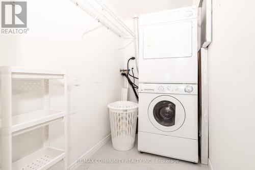 211 - 480 Mclevin Avenue, Toronto E11, ON - Indoor Photo Showing Laundry Room