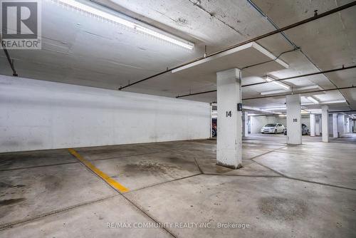 211 - 480 Mclevin Avenue, Toronto E11, ON - Indoor Photo Showing Garage