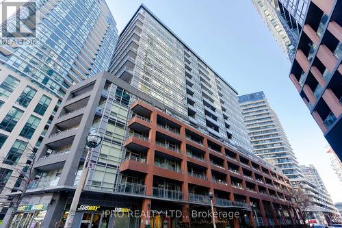 414 - 15 Bruyeres Mews, Toronto (Niagara), ON - Outdoor With Balcony With Facade