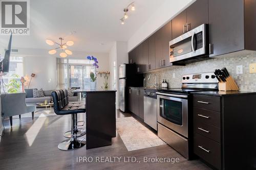 414 - 15 Bruyeres Mews, Toronto (Niagara), ON - Indoor Photo Showing Kitchen With Stainless Steel Kitchen