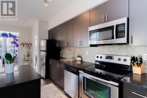 414 - 15 Bruyeres Mews, Toronto (Niagara), ON - Indoor Photo Showing Kitchen With Stainless Steel Kitchen