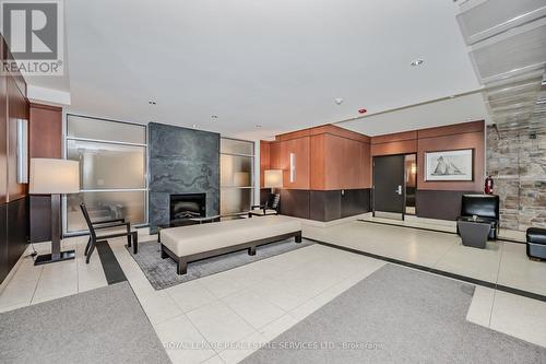 302 - 80 Port Street E, Mississauga, ON - Indoor With Fireplace