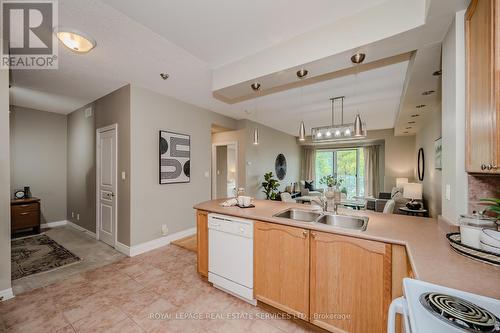 302 - 80 Port Street E, Mississauga (Port Credit), ON - Indoor Photo Showing Kitchen With Double Sink