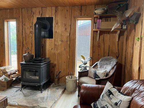 Swan River, Manitoba - Indoor Photo Showing Living Room With Fireplace