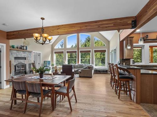 609 Wild Rose Drive, Merritt, BC - Indoor Photo Showing Dining Room With Fireplace