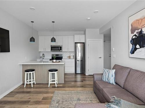 204-1515 Redfern St, Victoria, BC - Indoor Photo Showing Kitchen With Stainless Steel Kitchen