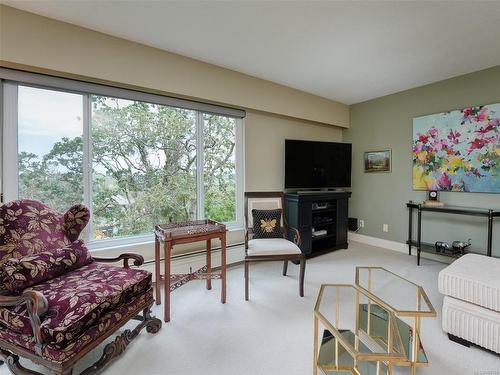 402-2920 Cook St, Victoria, BC - Indoor Photo Showing Living Room With Fireplace