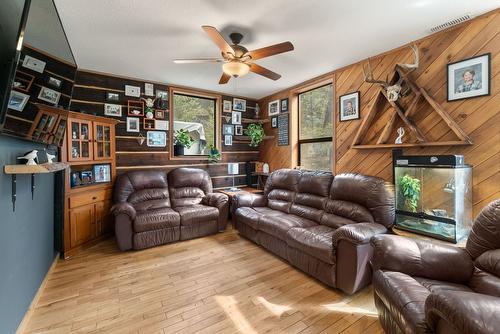 1809 Cardinal Creek Road, Kelowna, BC - Indoor Photo Showing Other Room With Fireplace