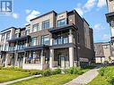 318 - 2550 Castlegate Crossing Drive, Pickering (Duffin Heights), ON  - Outdoor With Balcony With Facade 