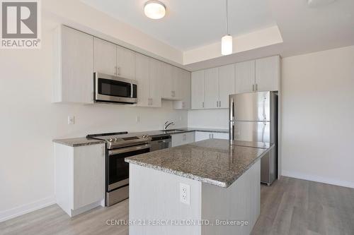 318 - 2550 Castlegate Crossing Drive, Pickering (Duffin Heights), ON - Indoor Photo Showing Kitchen With Stainless Steel Kitchen With Upgraded Kitchen