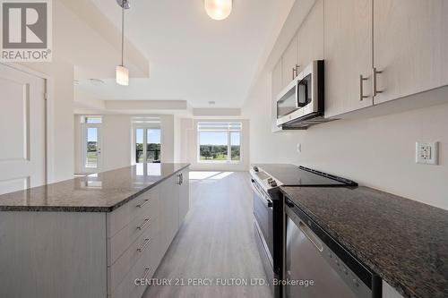 318 - 2550 Castlegate Crossing Drive, Pickering (Duffin Heights), ON - Indoor Photo Showing Kitchen