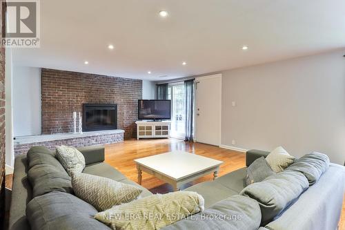 32 Dorcot Avenue, Toronto, ON - Indoor Photo Showing Living Room With Fireplace