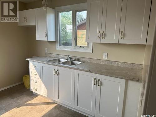 504 Cook Crescent S, La Ronge, SK - Indoor Photo Showing Kitchen With Double Sink