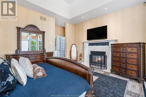 490 Shoreview, Windsor, ON - Indoor Photo Showing Bedroom With Fireplace