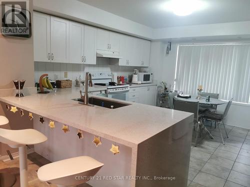 9 - 5005 Oscar Peterson Boulevard E, Mississauga, ON - Indoor Photo Showing Kitchen
