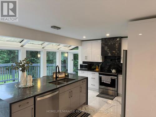 1491 Finch Avenue, Pickering (Liverpool), ON - Indoor Photo Showing Kitchen With Double Sink