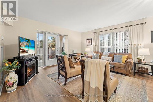 114 - 830 Scollard Court, Mississauga, ON - Indoor Photo Showing Living Room With Fireplace