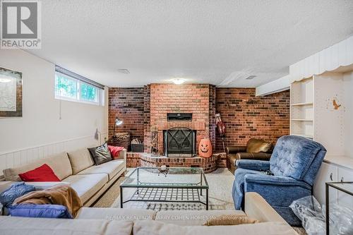 9 Cumbrian Court, Brampton, ON - Indoor Photo Showing Living Room With Fireplace
