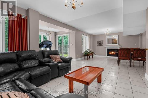 77 Rowntree Mill Road, Toronto W05, ON - Indoor Photo Showing Living Room With Fireplace