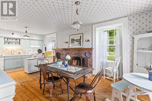 212 Clouston Road, Alnwick/Haldimand, ON - Indoor Photo Showing Dining Room With Fireplace