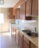 218 2Nd Avenue E, Rosetown, SK  - Indoor Photo Showing Kitchen With Double Sink 