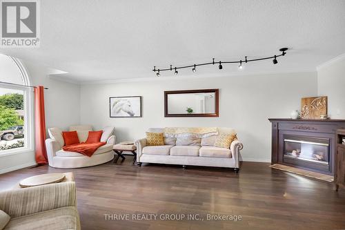 307 Frances Street, Central Elgin (Port Stanley), ON - Indoor Photo Showing Living Room With Fireplace