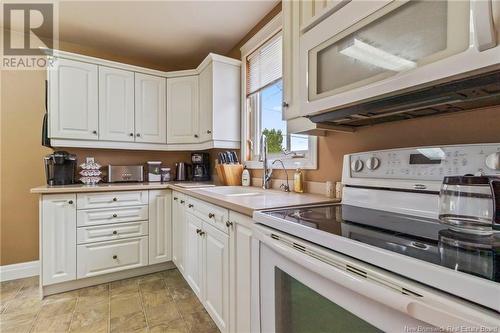 4345 Water Street, Miramichi, NB - Indoor Photo Showing Kitchen With Double Sink