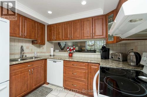 #202 - 330 Mill Street, Brampton, ON - Indoor Photo Showing Kitchen With Double Sink