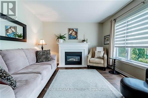 13 Mccaffery Crescent, St. Catharines, ON - Indoor Photo Showing Living Room With Fireplace