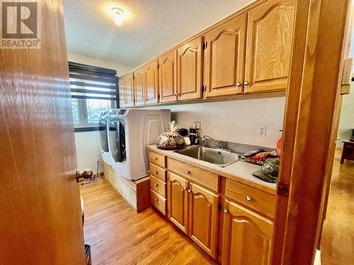 9495 235 Road, Dawson Creek, BC - Indoor Photo Showing Laundry Room