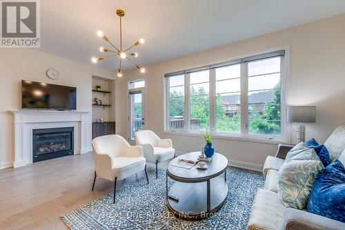 3129 Riverpath Common, Oakville, ON - Indoor Photo Showing Living Room With Fireplace