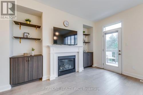 3129 Riverpath Common, Oakville, ON - Indoor Photo Showing Living Room With Fireplace