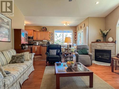 3808 Cypress Hills Drive, Osoyoos, BC - Indoor Photo Showing Living Room With Fireplace