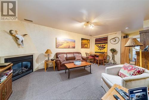 77 Crosswinds, Kingsville, ON - Indoor Photo Showing Living Room With Fireplace