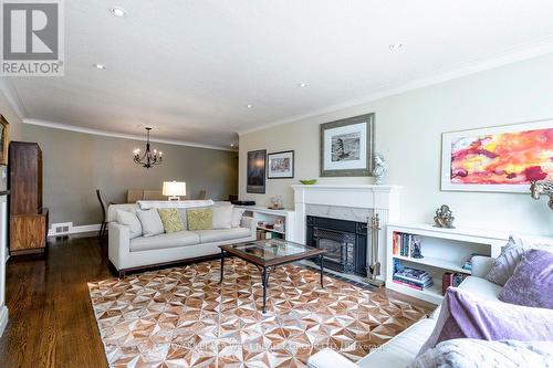 12 Kirk Bradden Road E, Toronto, ON - Indoor Photo Showing Living Room With Fireplace