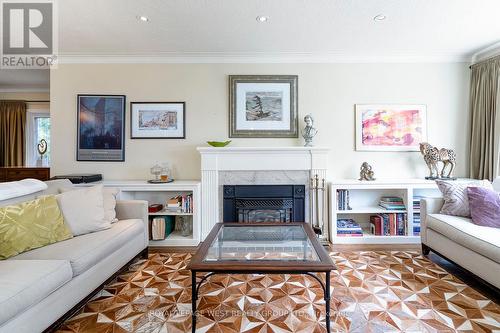 12 Kirk Bradden Road E, Toronto (Stonegate-Queensway), ON - Indoor Photo Showing Living Room With Fireplace