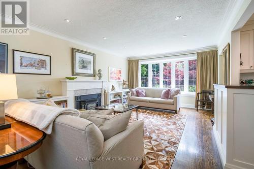 12 Kirk Bradden Road E, Toronto (Stonegate-Queensway), ON - Indoor Photo Showing Living Room With Fireplace